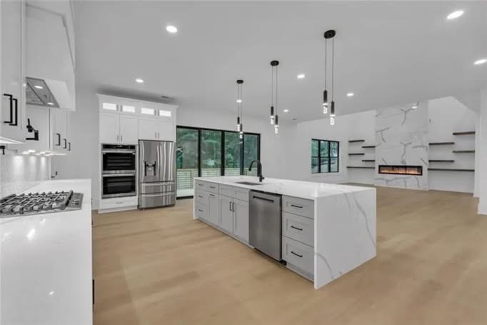 Wide view of the finished kitchen and island